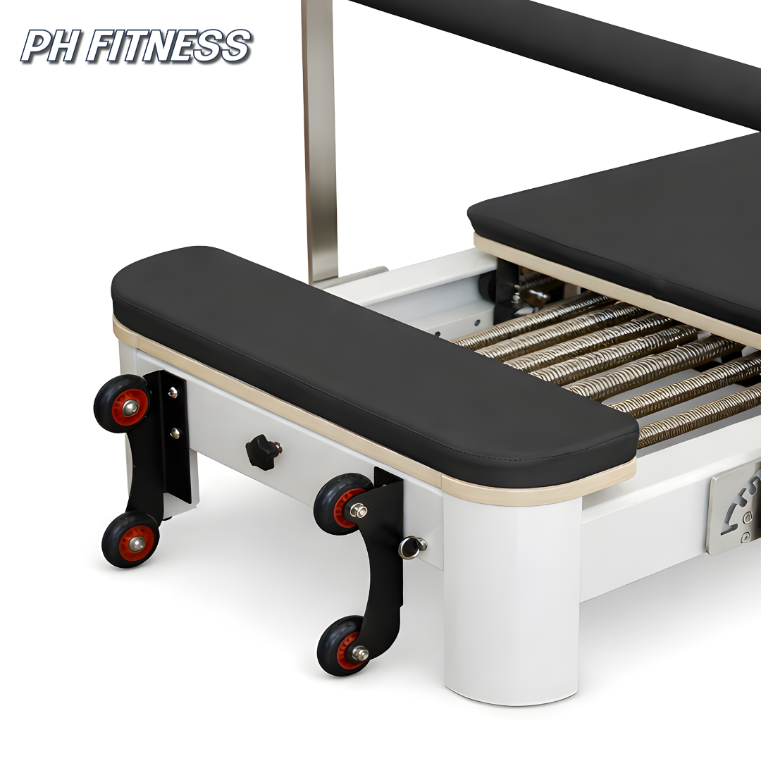 Roulettes de transport et barre de pieds réglable du Reformer Pilates PRO
