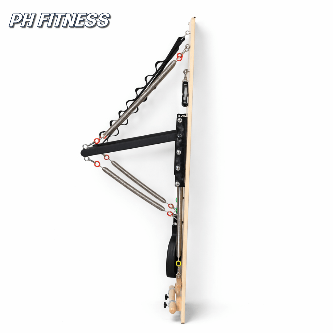 Vue latérale de l’appareil mural Pilates compact PH Fitness