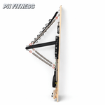 Vue latérale de l’appareil mural Pilates compact PH Fitness