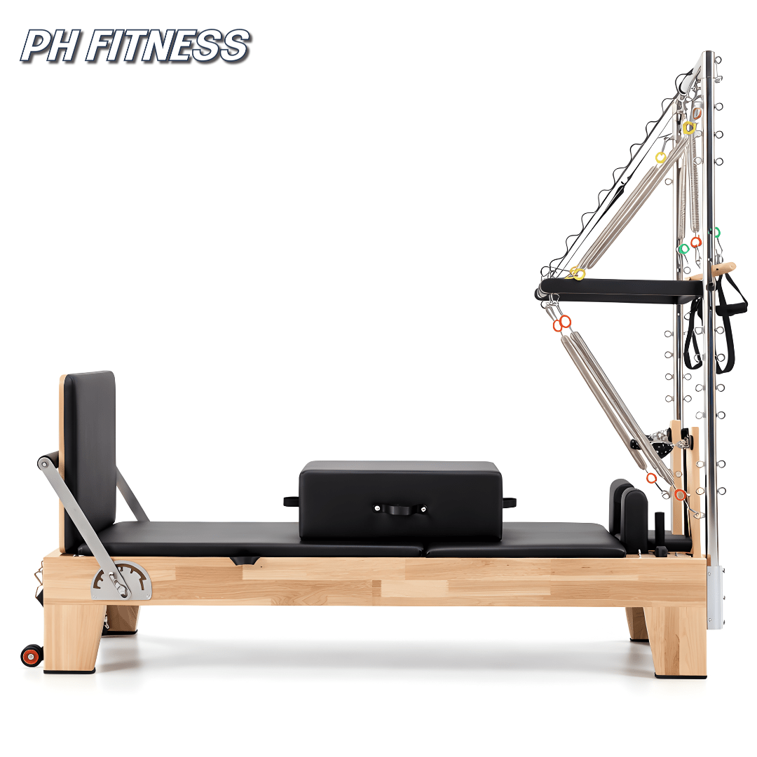 Vue latérale du Reformer Pilates en bois avec Half Trapeze Tower